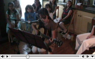 Gabriella at the guitar