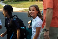 Elisa Boarding the Bus to 4th Grade