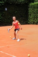 Elisa learning tennis