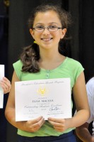 Elisa receiving the President's Award for Educational Excellence