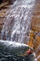 Elisa swimming under Trehman's Falls